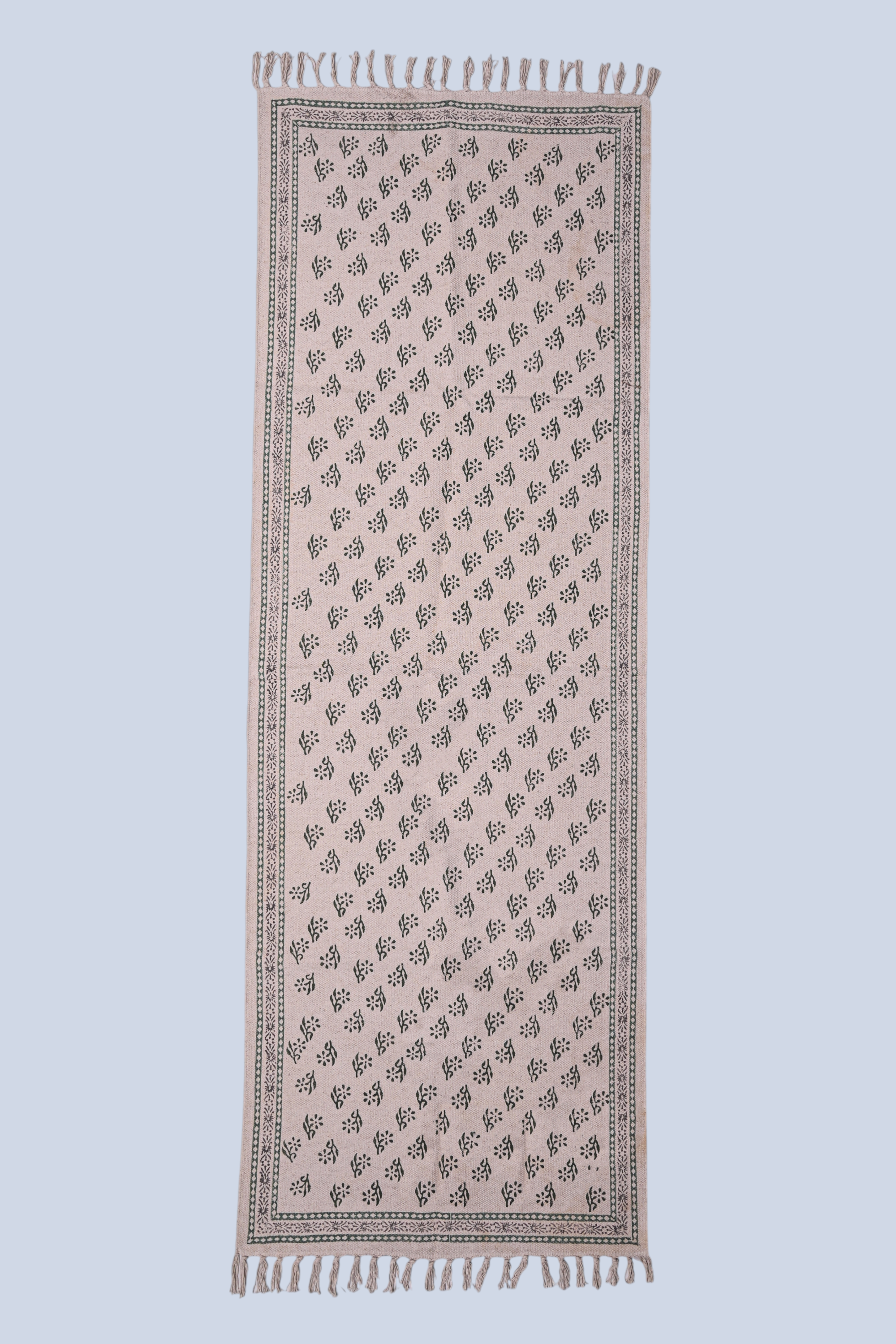 green cotton runner rug styled in modern hallway interior with minimal decor