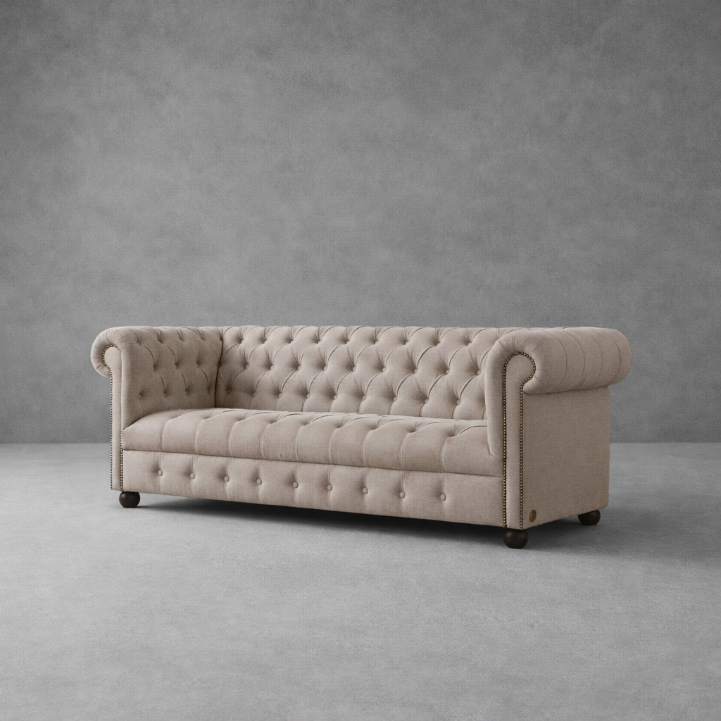 Angled view of Luxe Chesterfield velvet sofa with premium velvet upholstery and rolled arms.