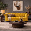 Luxe Chesterfield velvet sofa with classic button tufting and rolled arms.
